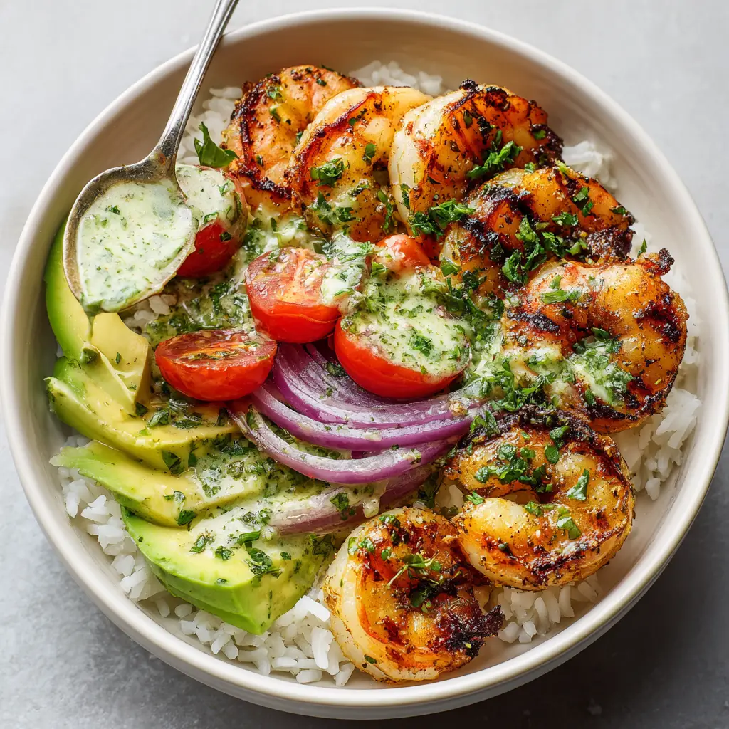 Assembling the easy shrimp and avocado rice bowl before adding the final dressing.