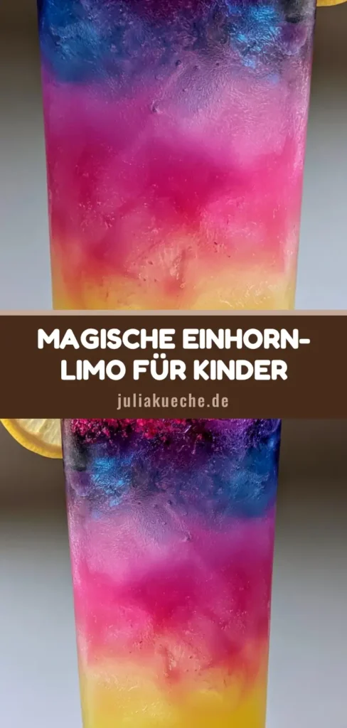 Einhorn-Limonade: Das magische Rezept für spektakuläre Farbschichten 4 Ein hohes Glas mit dreifarbiger Einhorn-Limonade: gelbe Basis, pinke Mitte und violetter Abschluss, garniert mit pinkem Zuckerrand und Zitrone.